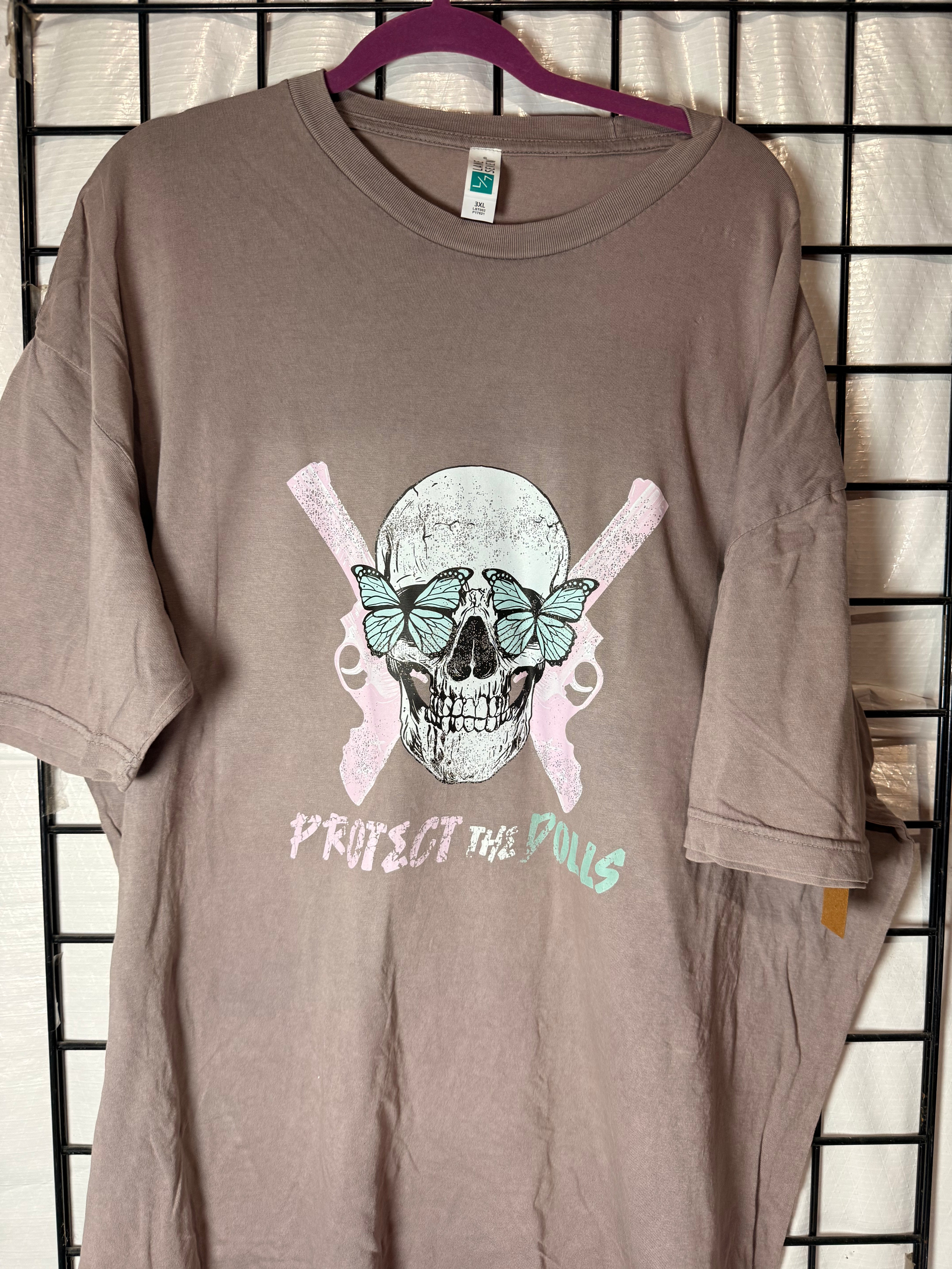 Protect the Dolls Vintage Crewneck Tee — Reclaimed Skull & Pistols with Turquoise Butterflies